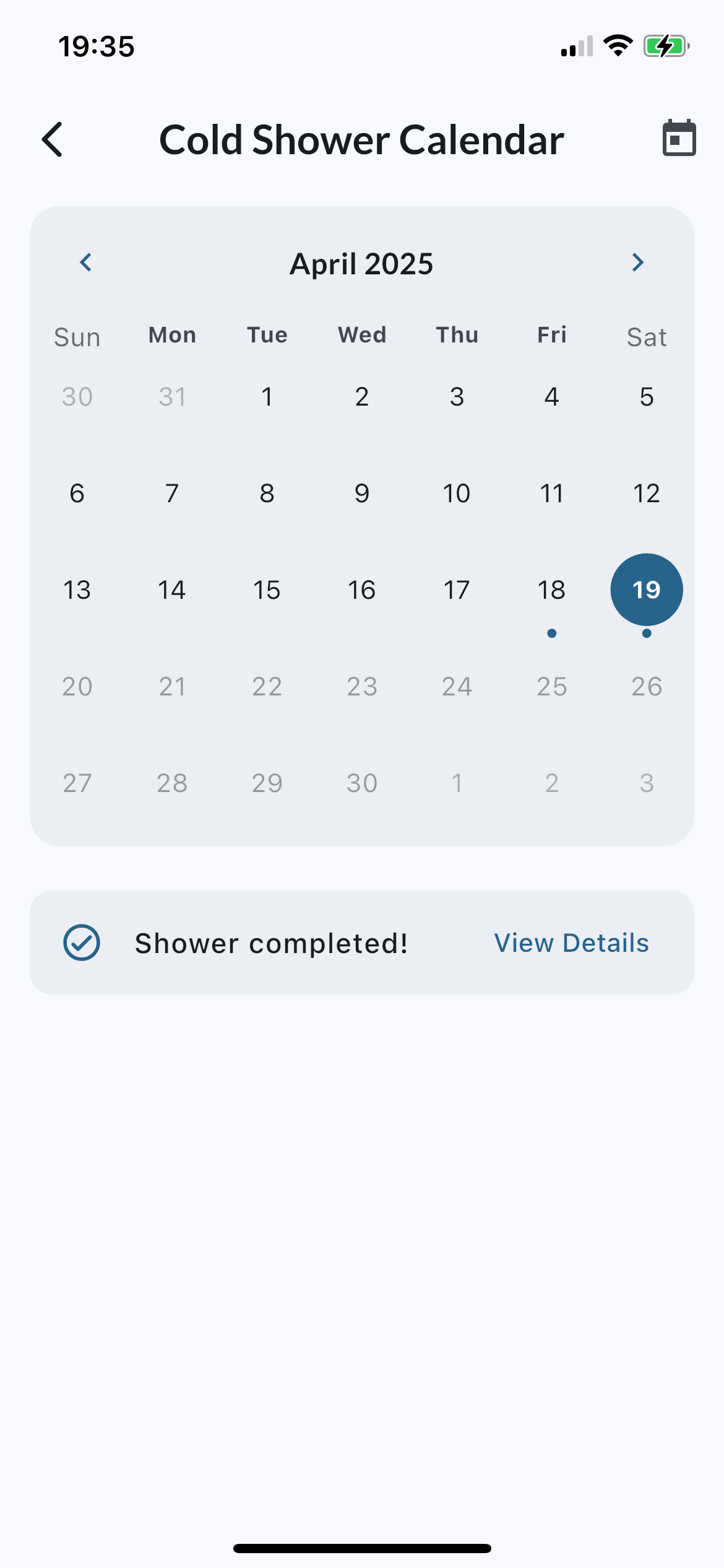 Cosho app calendar view displaying monthly cold shower consistency